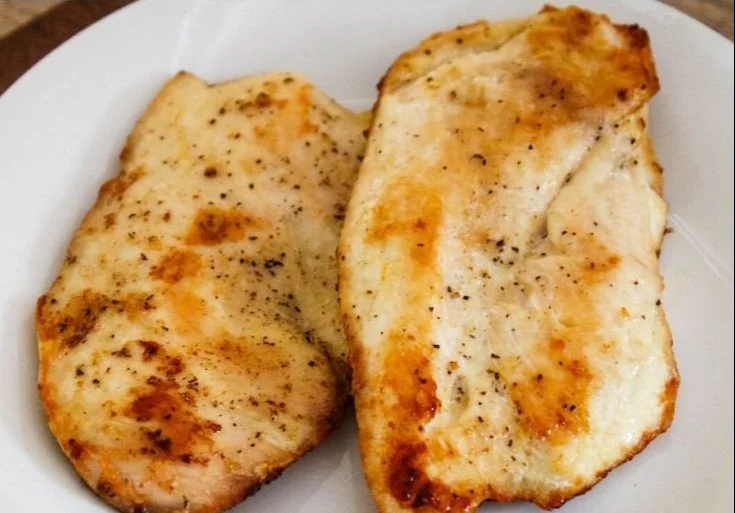 Air fryer juicy and tender chicken breasts ready to serve