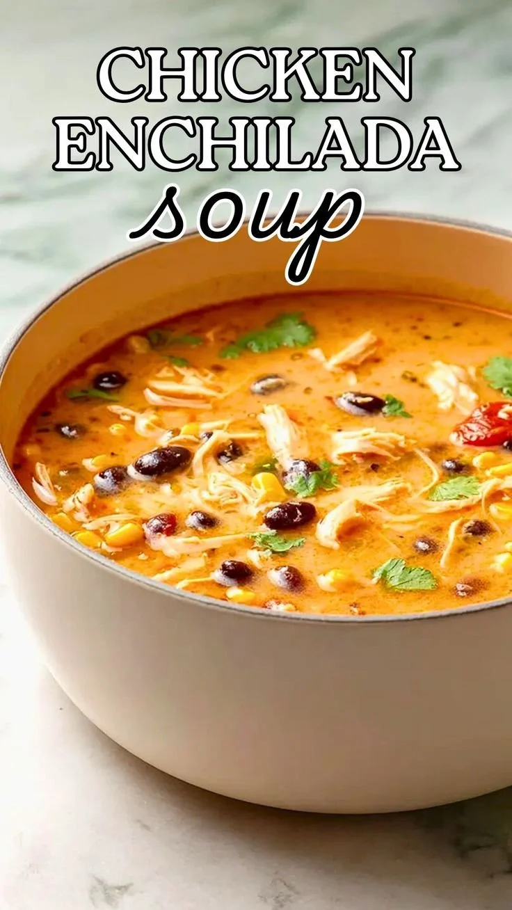 Delicious bowl of chicken enchilada soup garnished with cilantro and cheese