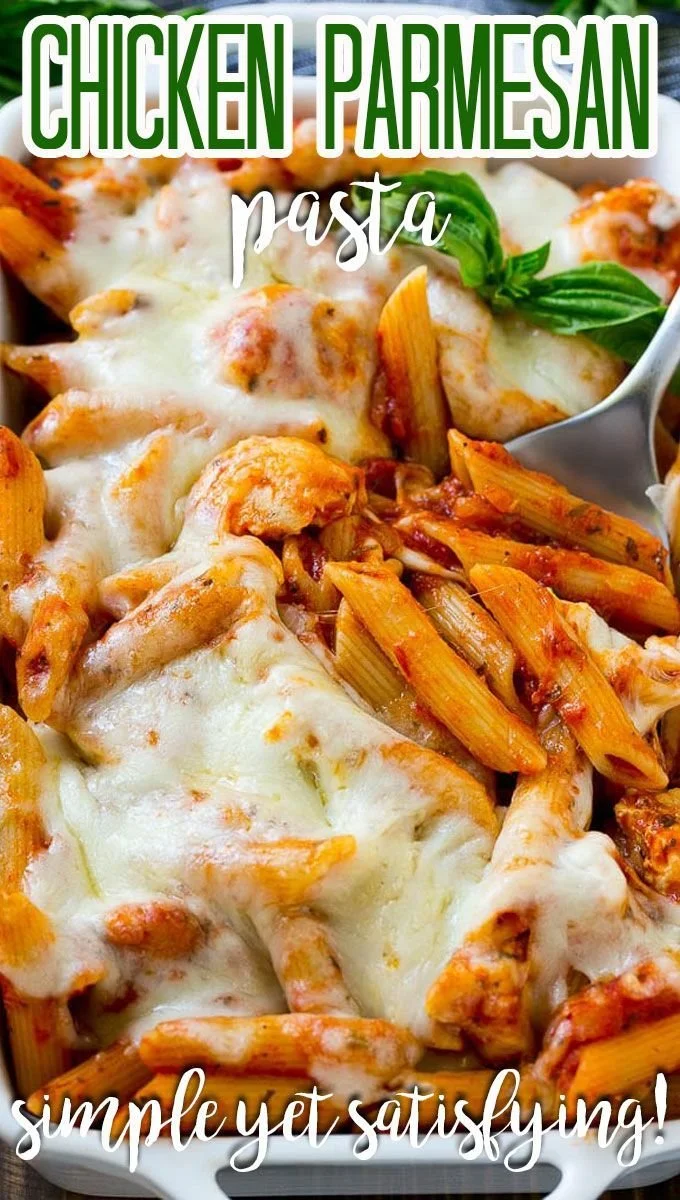 Plate of Chicken Parmesan Pasta garnished with herbs and parmesan cheese.