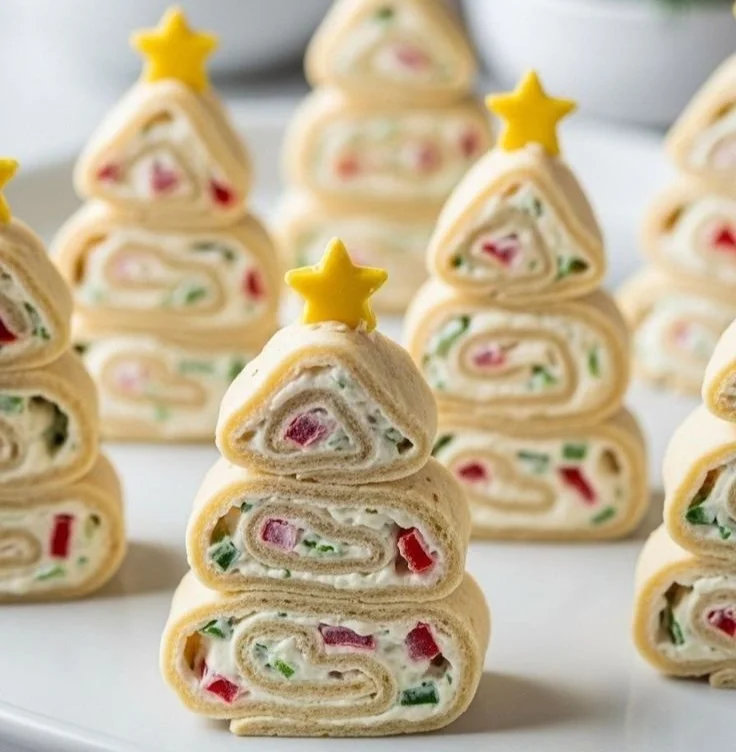 A variety of festive Christmas appetizers for a work potluck gathering.