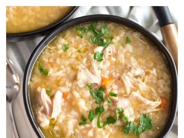 A warm bowl of Crock Pot Chicken Rice Soup ready to be enjoyed