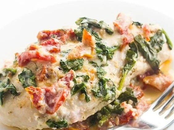Crock Pot Creamy Tuscan Garlic Chicken served with fresh herbs