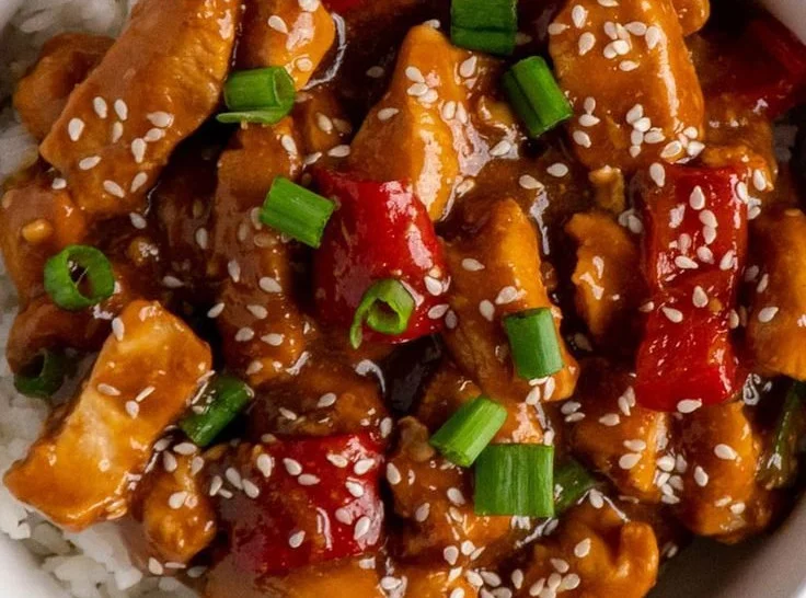 Crock Pot Sesame Chicken prepared with tender chicken and savory sauce