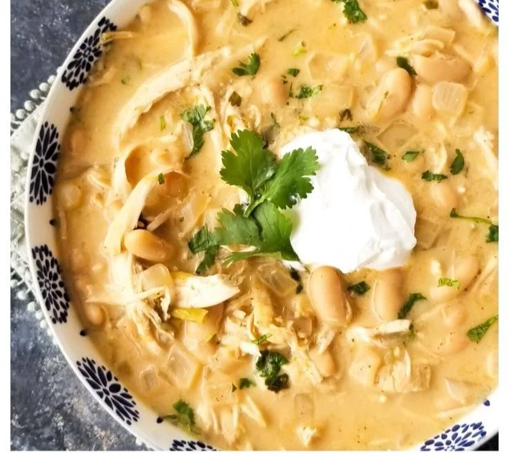 Delicious bowl of creamy white chicken chili made in a crockpot