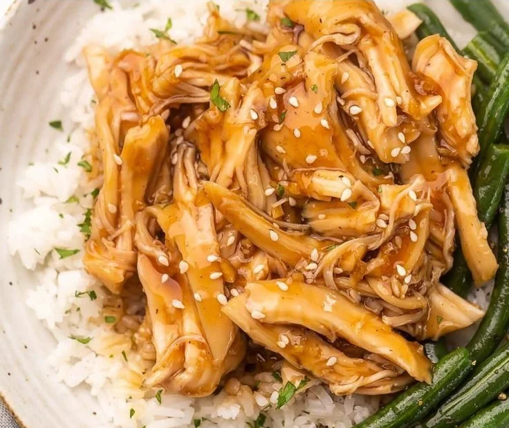 Crockpot Honey Garlic Chicken served with vegetables on a plate