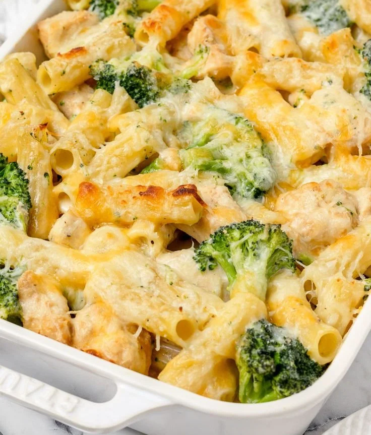 Delicious easy chicken broccoli pasta served in a bowl with fresh herbs