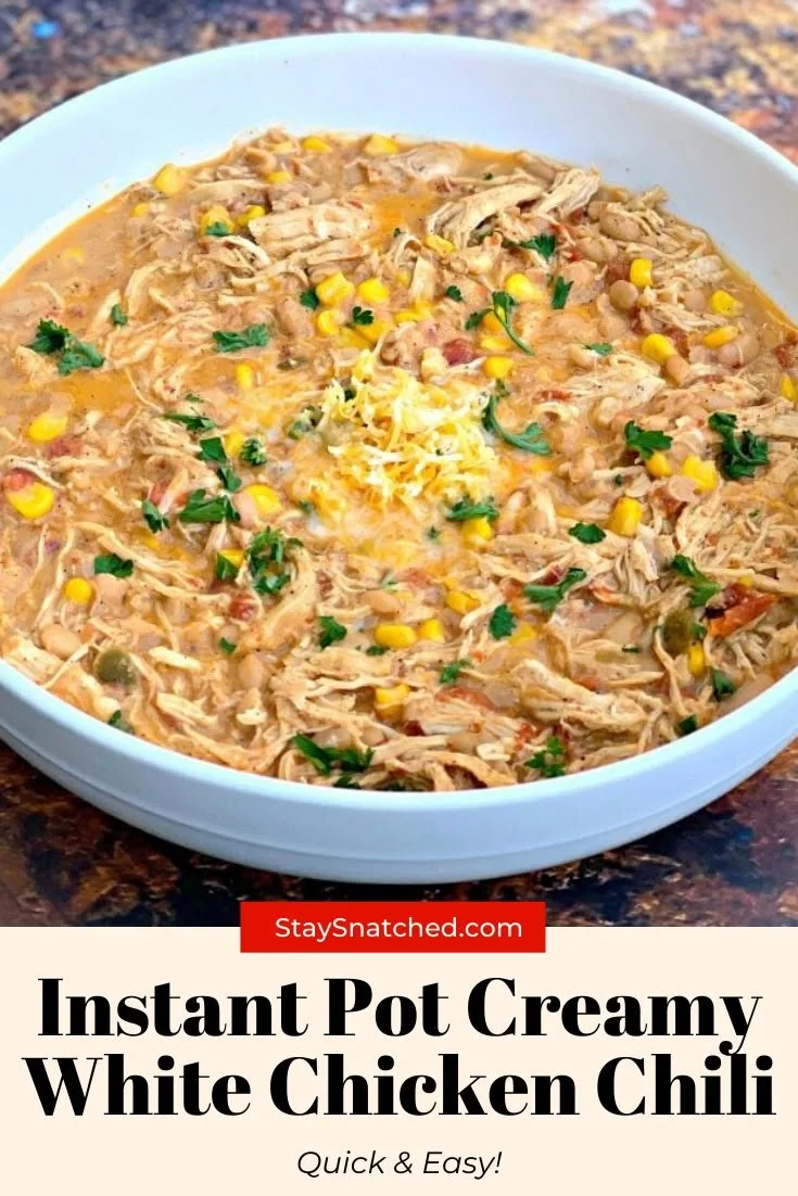 Bowl of creamy white chicken chili made in an Instant Pot with toppings.