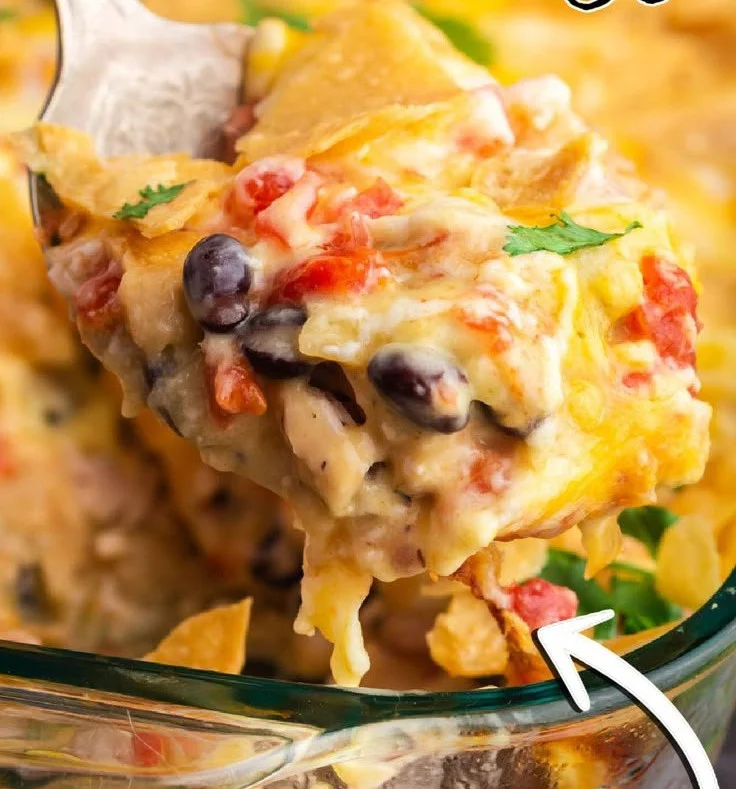 Delicious Mexican Chicken Casserole topped with cheese and spices