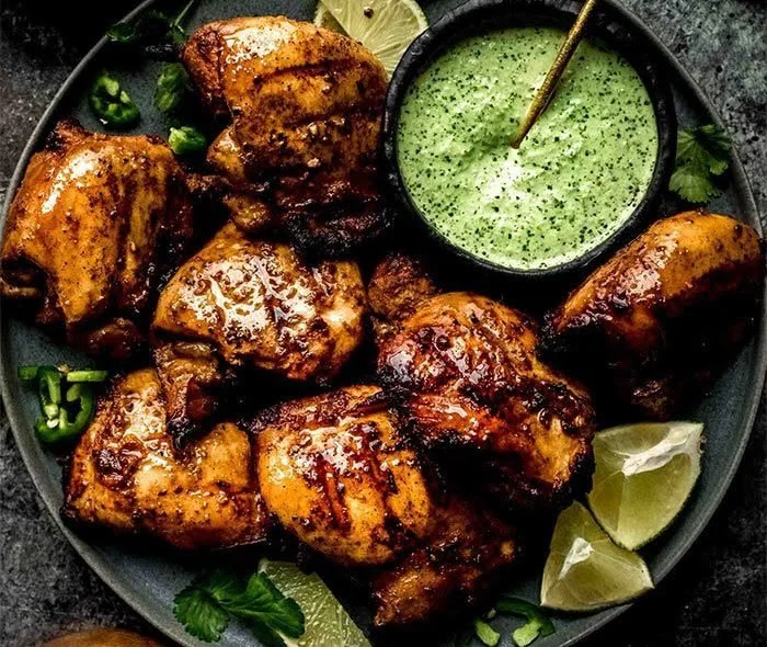 Delicious Peruvian grilled chicken served with sides
