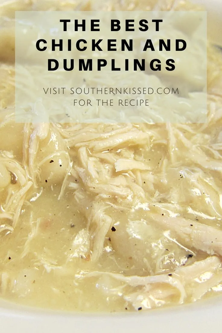 Bowl of homemade chicken and dumplings served with herbs and spices.