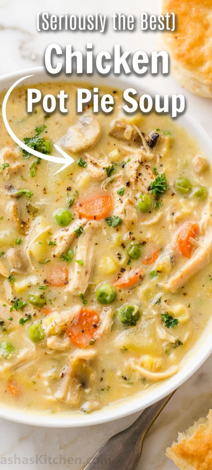 Delicious bowl of Chicken Pot Pie Soup topped with fresh herbs