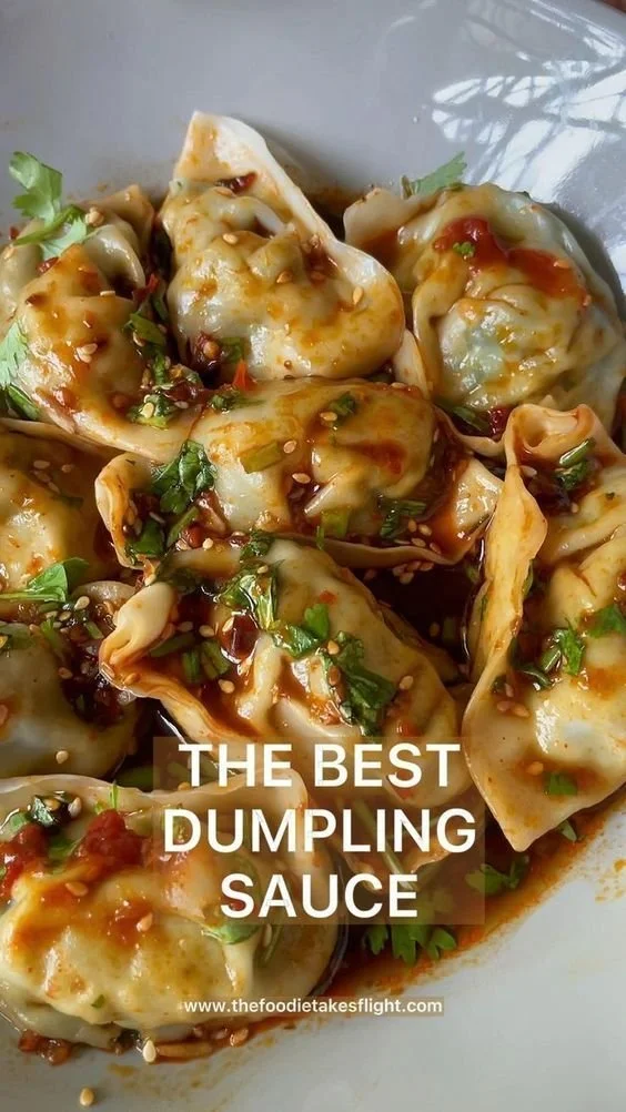 Bowl of the best dumpling sauce served with fresh dumplings