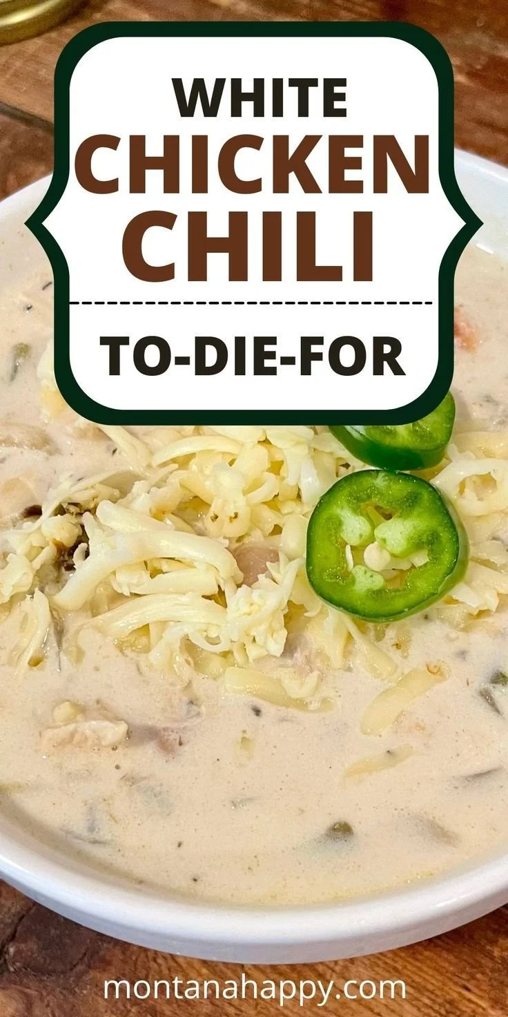 Delicious white chicken chili served in a bowl with toppings.
