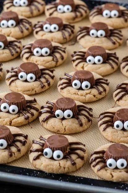 Delicious Halloween party foods including spooky snacks and desserts for adults
