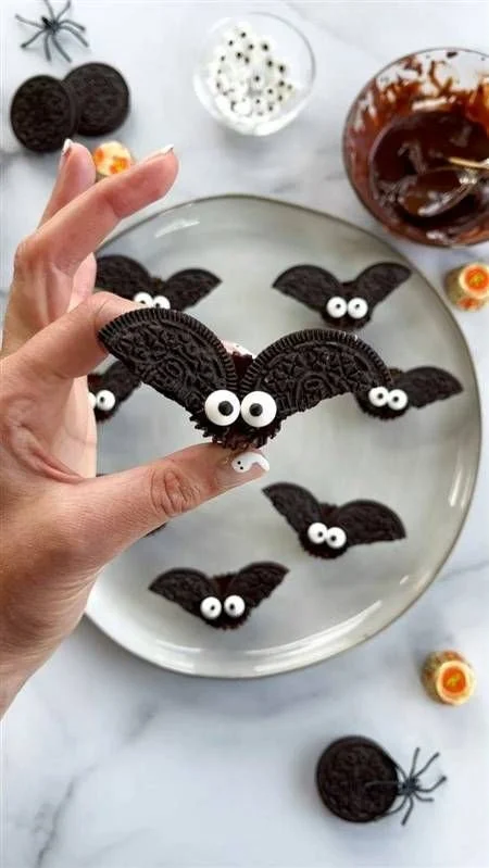 Decorative bat cookies made with Oreo and Reese's for Halloween treats.