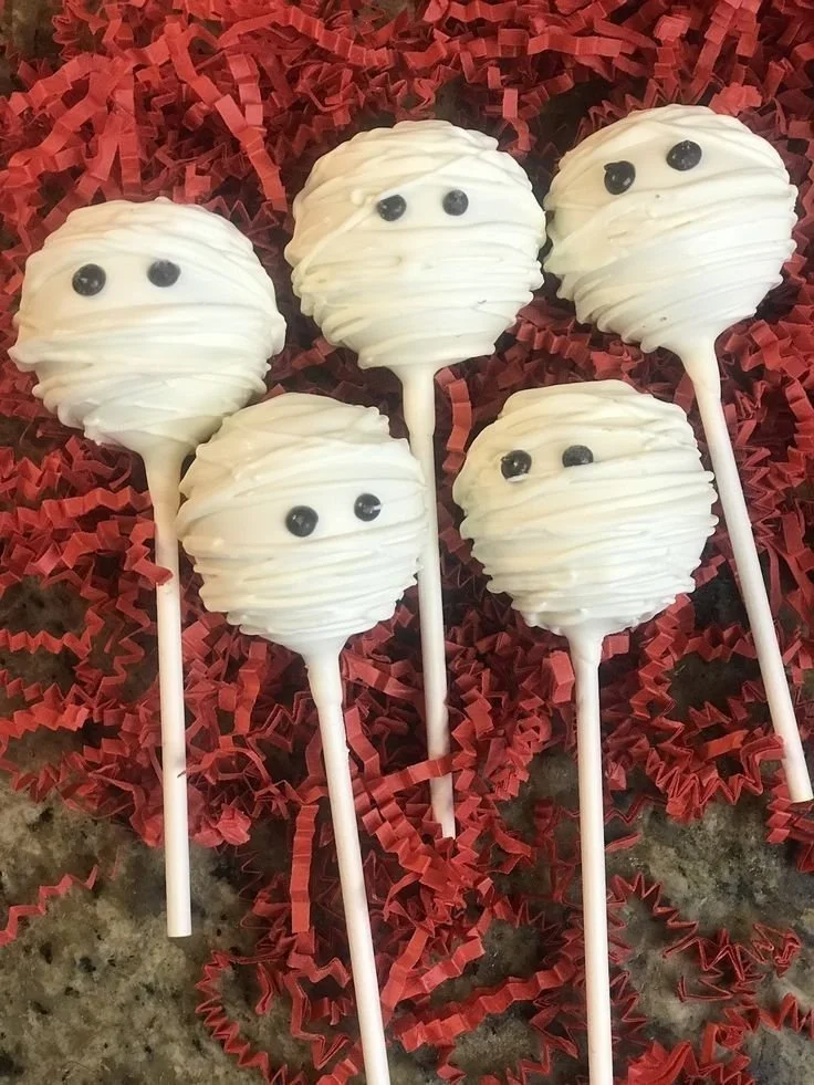 Spooky Halloween food ideas including dessert recipes and cake pops for a Halloween sleepover.