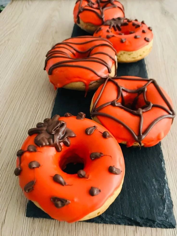 Colorful Halloween donuts decorated for a festive celebration.