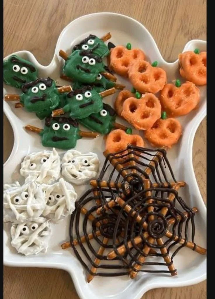 Creative Halloween treats including edible witches and pretzel ideas.