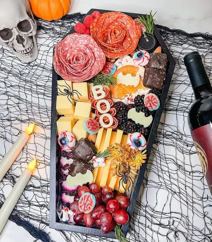 Spooky Halloween charcuterie board with creative and festive treats