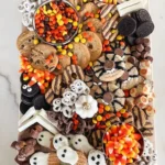 halloween candy board ideas haute off the rack 2026 08 06 181920 1