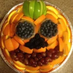 halloween fruit tray with pumpkin shaped fruit pla 2026 08 07 181929 1