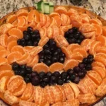 orange and black berry platter with celery hallo 2026 08 06 181934 1