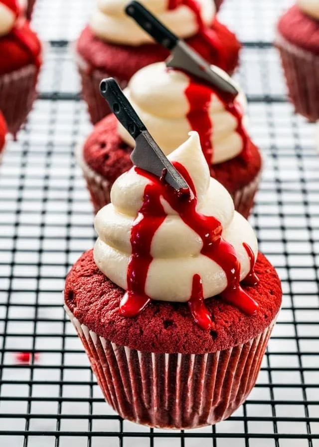 Spooky red velvet cupcakes with white frosting for Halloween desserts