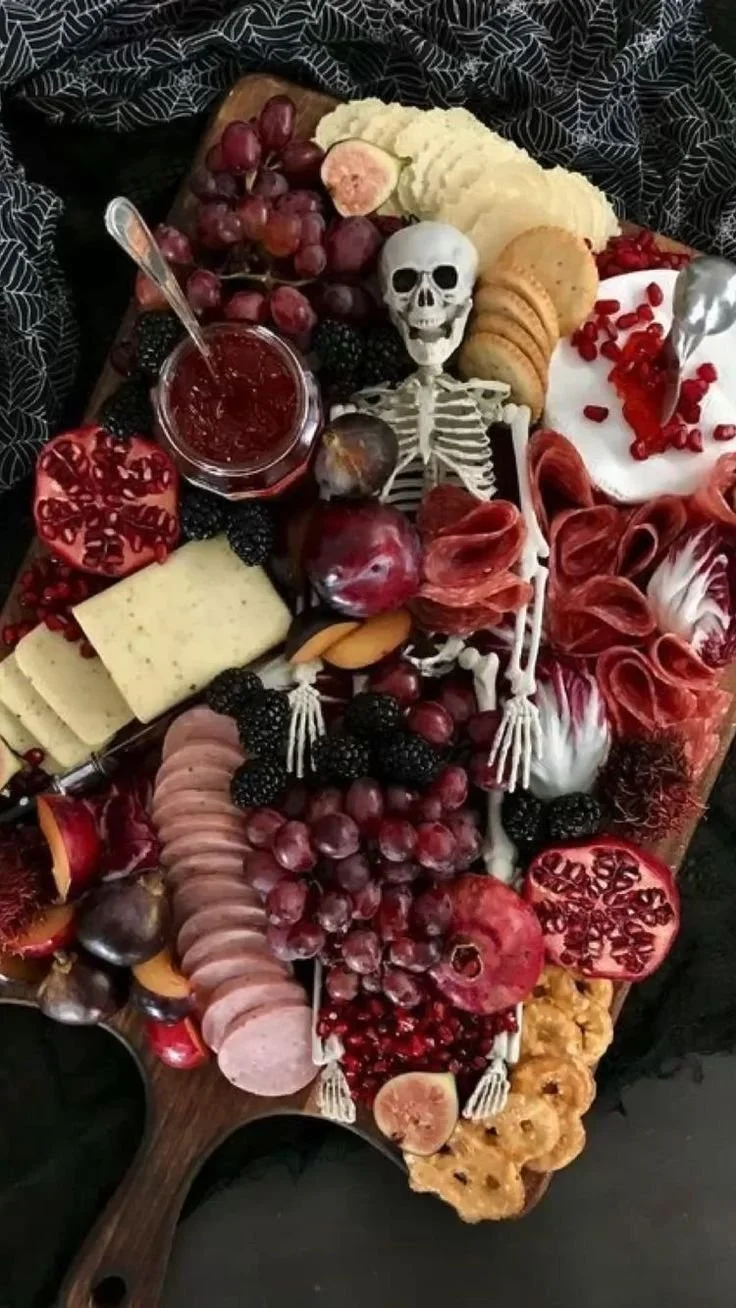 Skeleton charcuterie table for a spooky Halloween dinner party