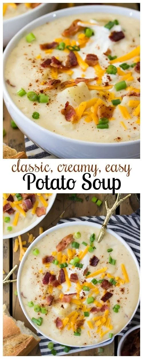 Bowl of creamy potato soup garnished with herbs and served with bread.