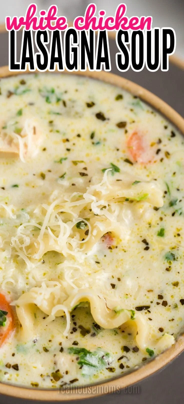 Bowl of creamy white chicken lasagna soup with herbs and cheese topping