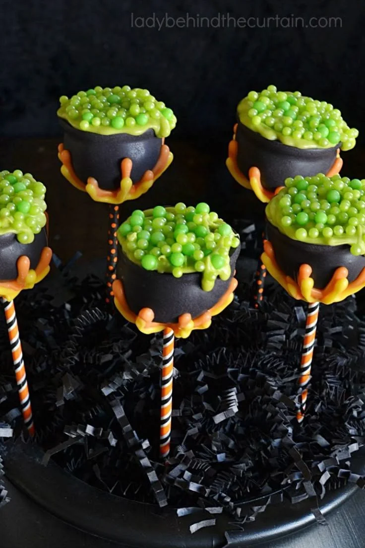 Witches Cauldron Cake Pops decorated for Halloween celebration